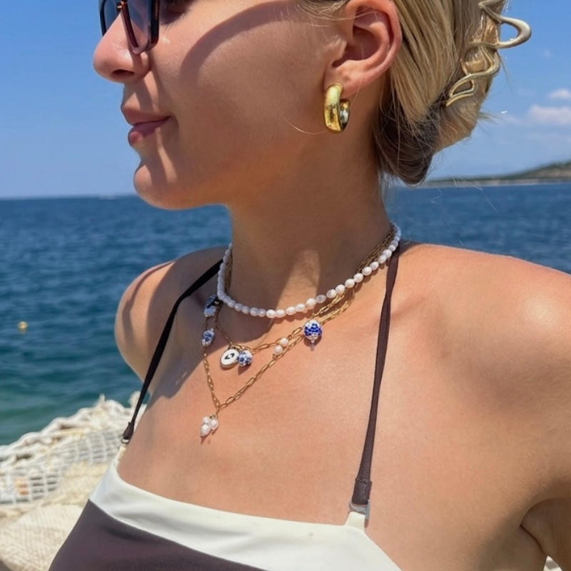 "deti" charm kaelakee "deti" charm kaelakee